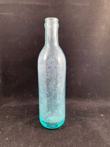 Light blue glass bottle from the Spring bottling facility at the Myles Standish Hotel, Duxbury